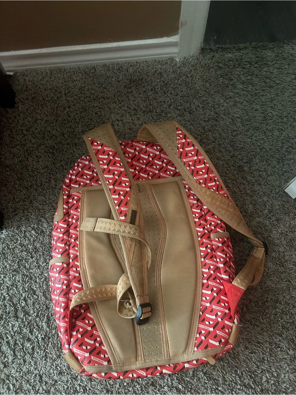 Sprayground Red Patterned Backpack with Tan Accent Panel